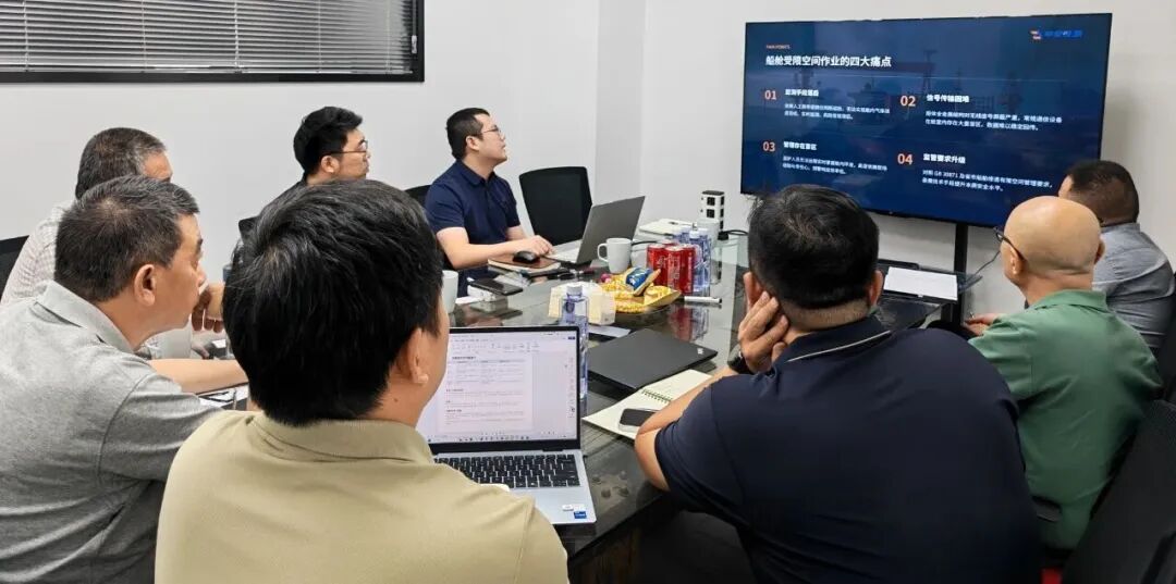 Meeting participants discuss four challenges in shipboard confined-space work